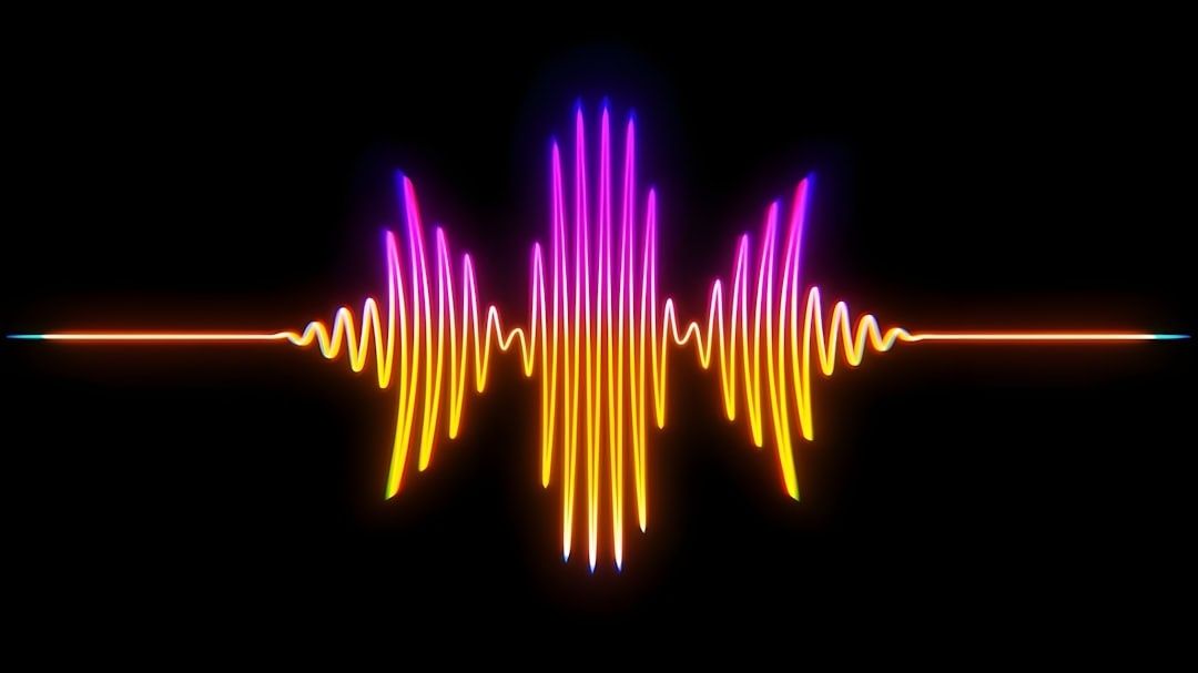 Glowing multicolored audio waveform on a black background